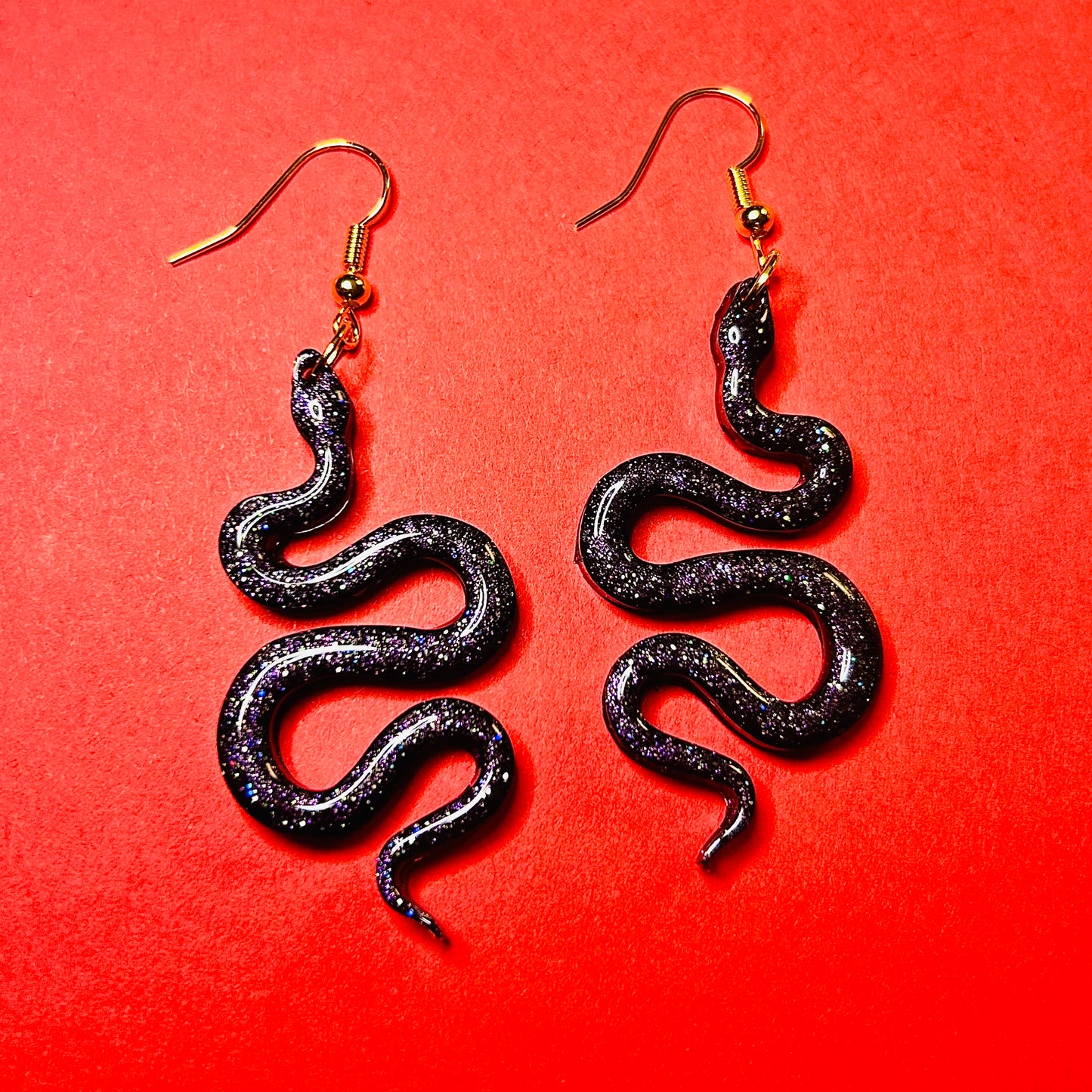 "Midnight Serpents"   Black multicolored glitter snake resin earrings